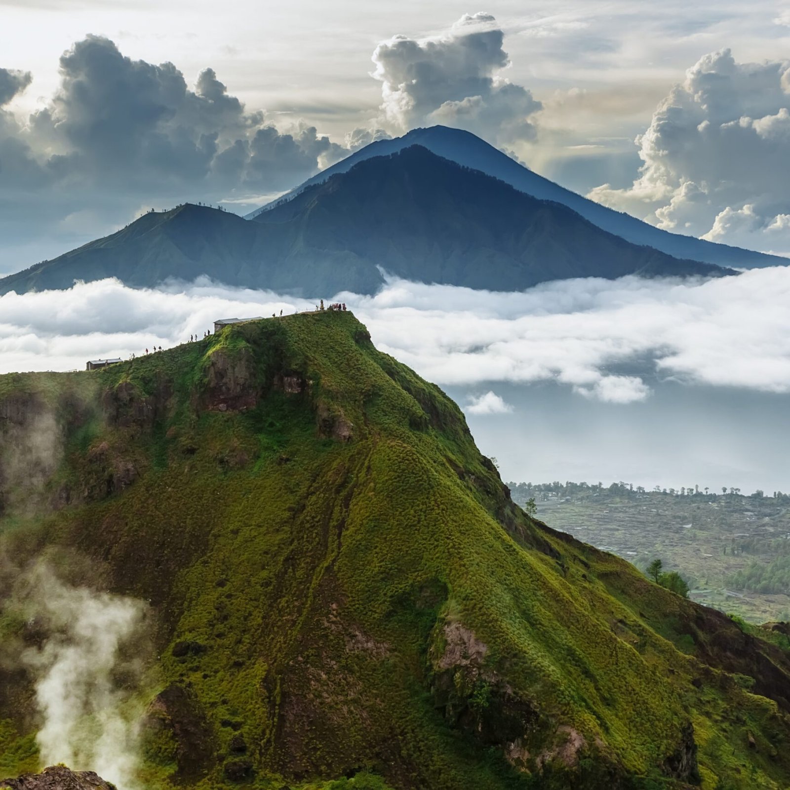 Active Indonesian volcano Batur in the tropical island Bali. Indonesia. Batur volcano sunrise serenity. Dawn sky at morning in mountain. Serenity of mountain landscape, travel concept.